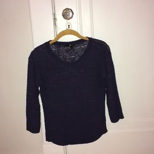 Navy blue knit sweater.